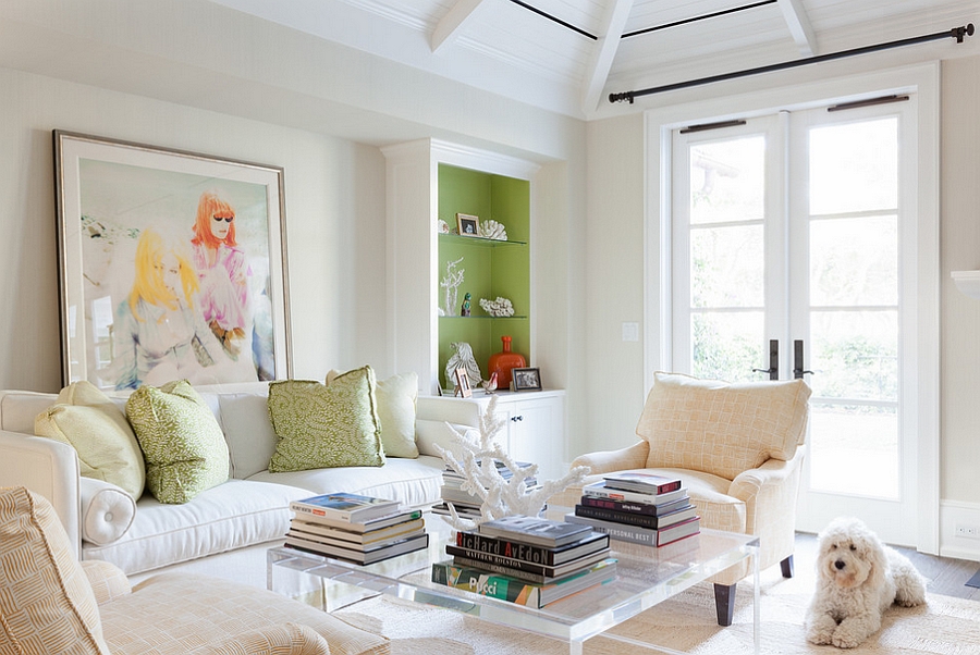 Tropical living room with casually placed books on the coffee table [Yorgos Efthymiadis Photography] 