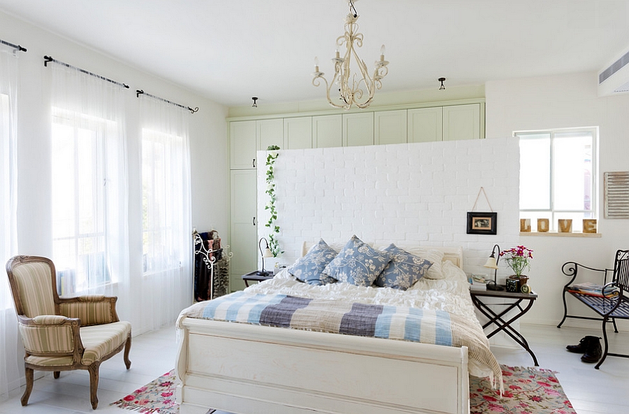 Unique wall behind the headboard draws your attention instantly