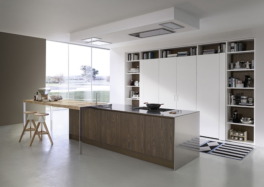 Wooden kitchen island and breakfast station add textural contrast to the sleek space