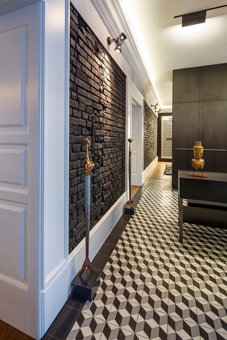 Accent lighting puts focus on the dark brick walls