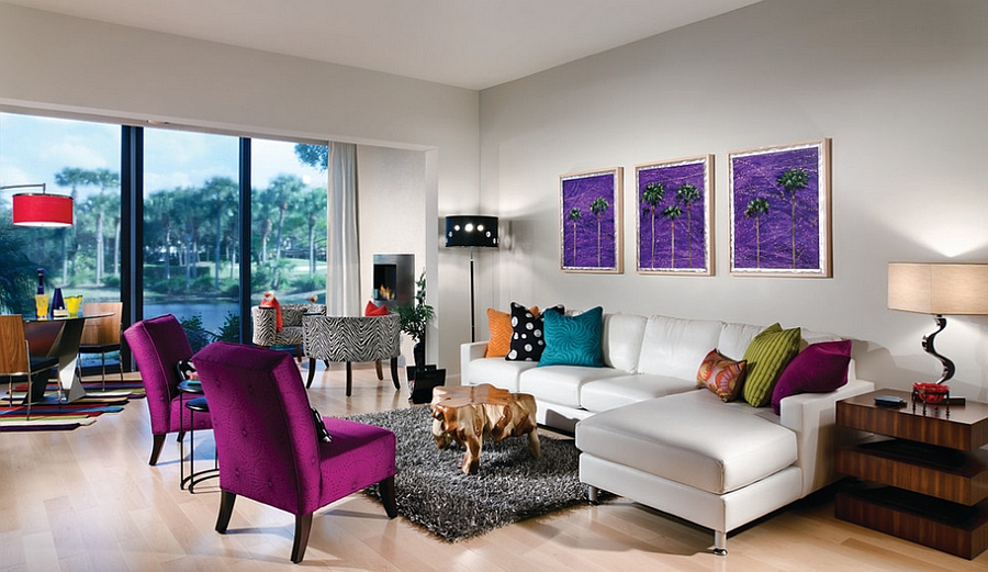 An array of accent colors brightens the posh living room [Design: Decorating Den Interiors]