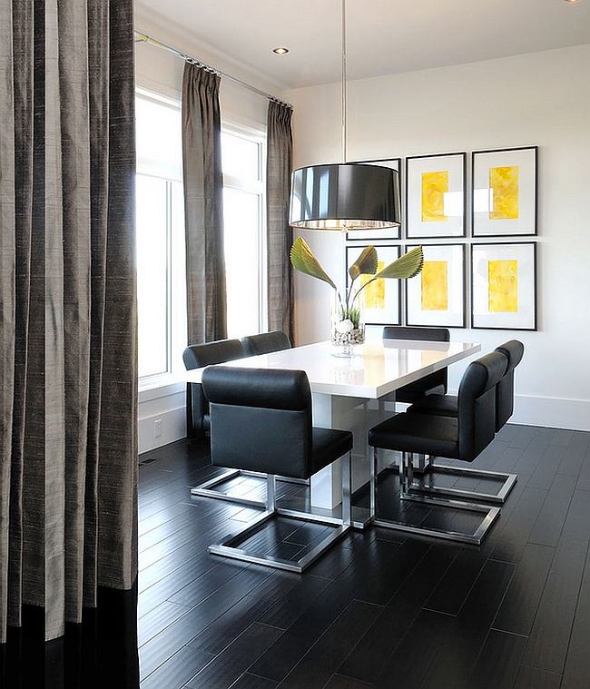 Black floor adds to the appeal of this posh dining room