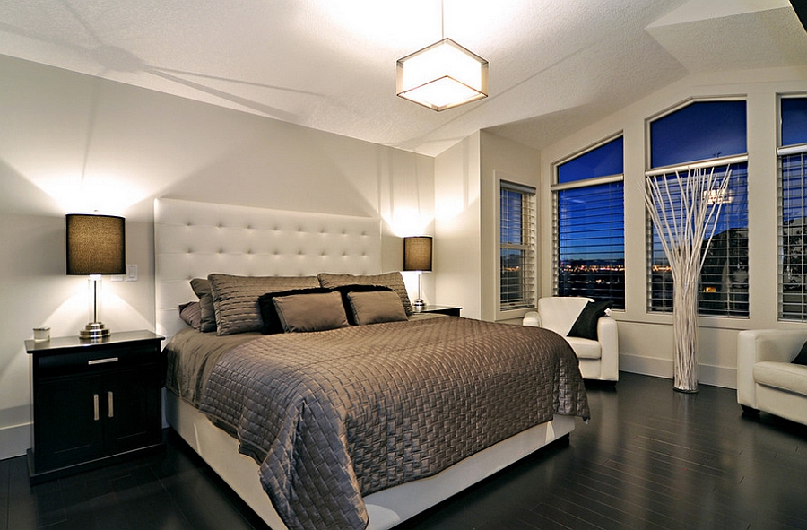 Black floor coupled with white walls in the contemporary bedroom