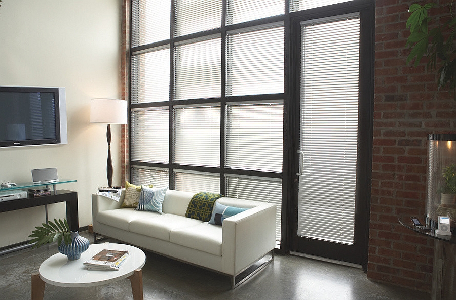 Brick walls give the masculine living room a classic, timeless appeal