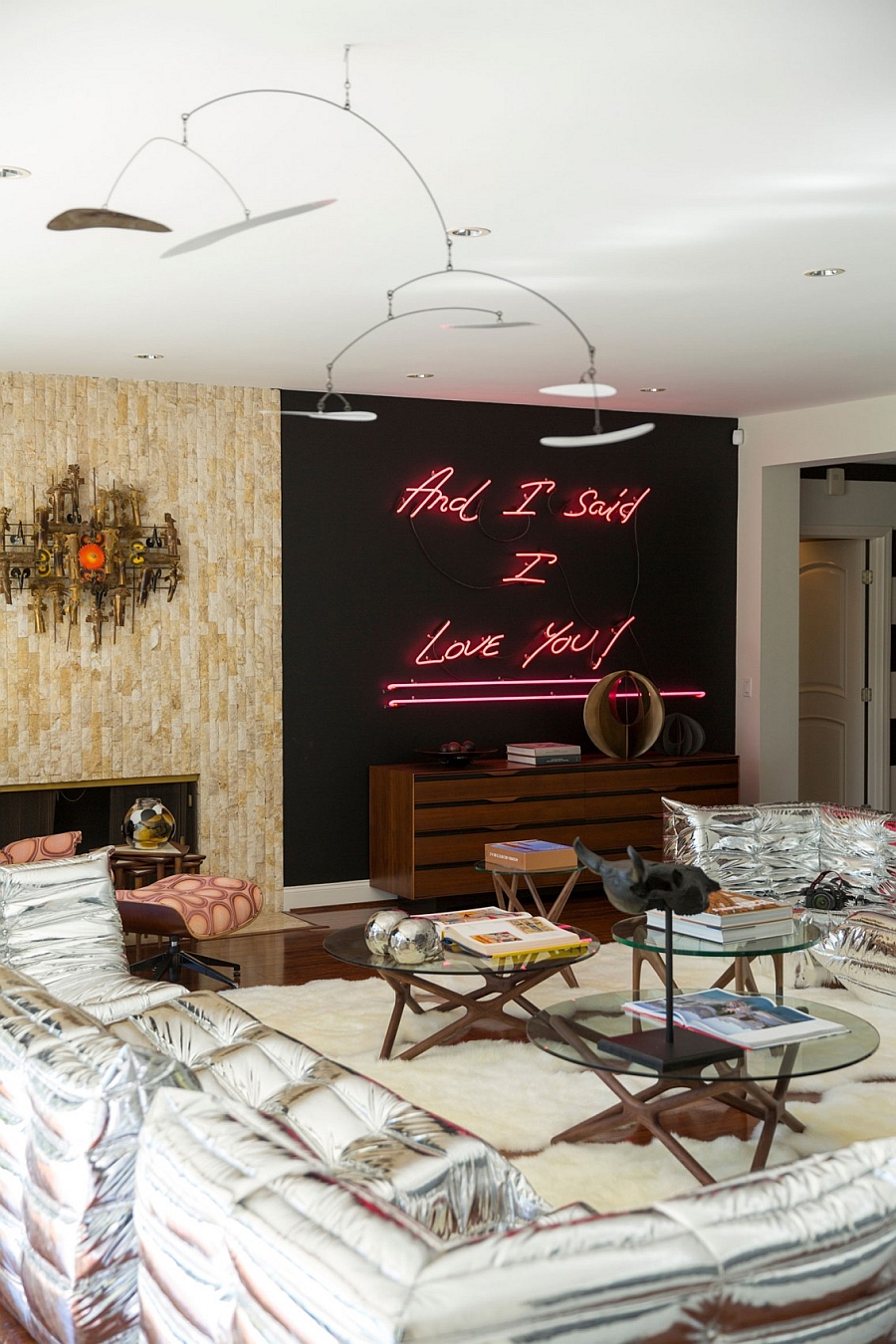 Brilliant neon sign on the living room wall steals the show