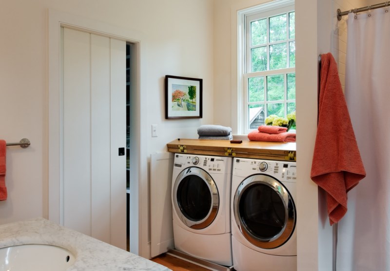 Colorful towels in a modern laundry room