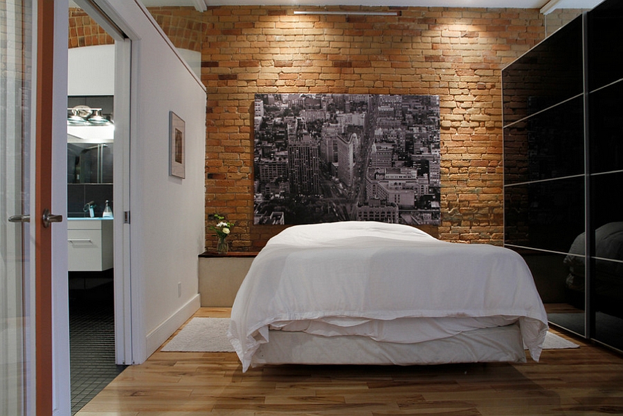 Contrasting black and white surfaces with a brick wall backdrop [Design: Esther Hershcovich]