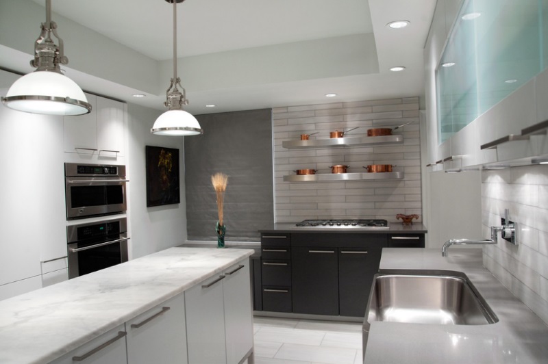 Copper pots on open stainless steel shelving