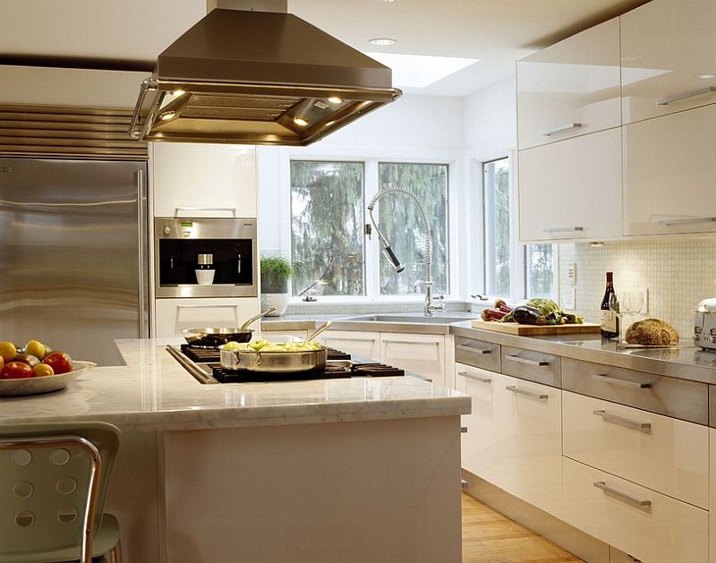 Corner sink in the kitchen with window above it [Design: Venegas and Company]