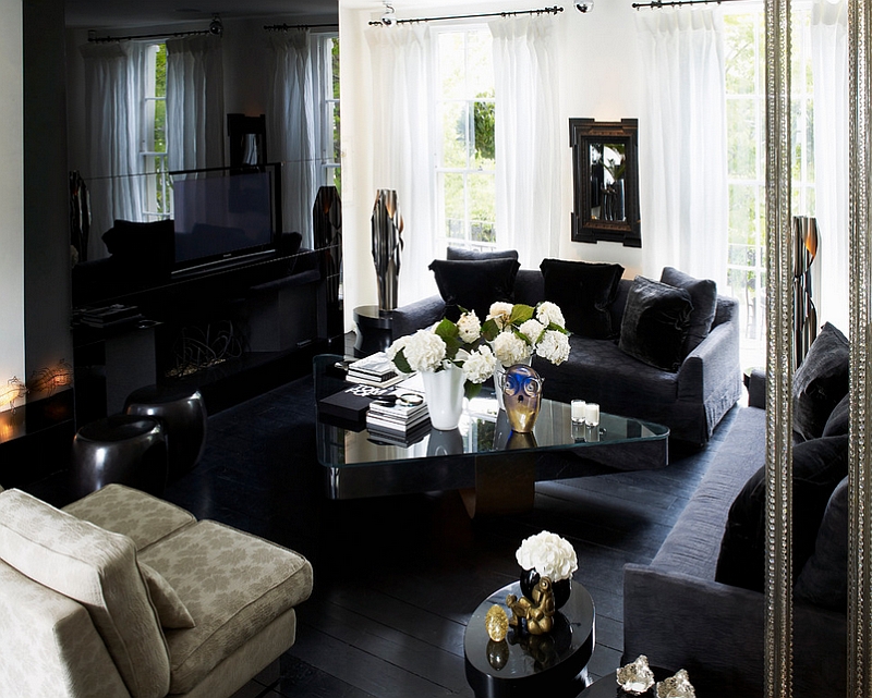 Cozy and elegant living room with dark hardwood floor [Design: Kelly Hoppen London]