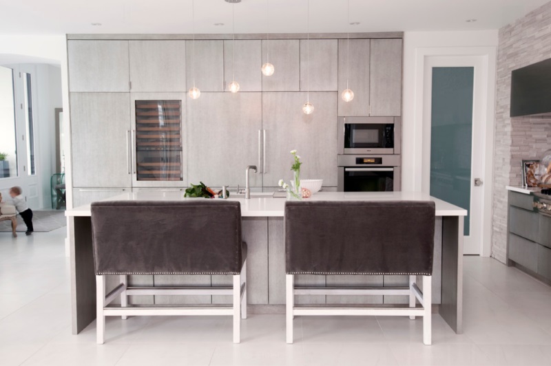 Cozy kitchen with plush barstools