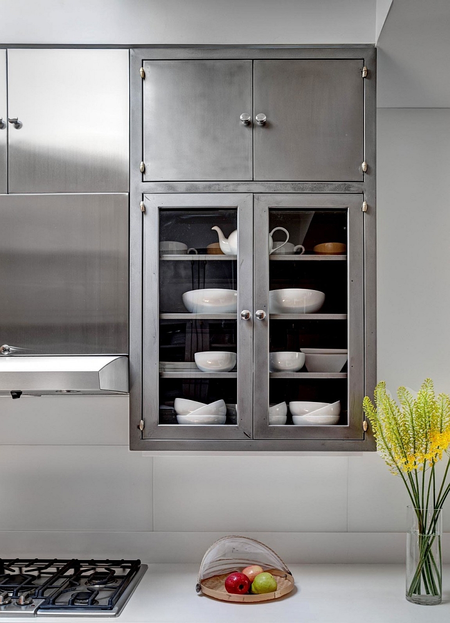 Create a lovely display in teh kitchen with glass door cabinets