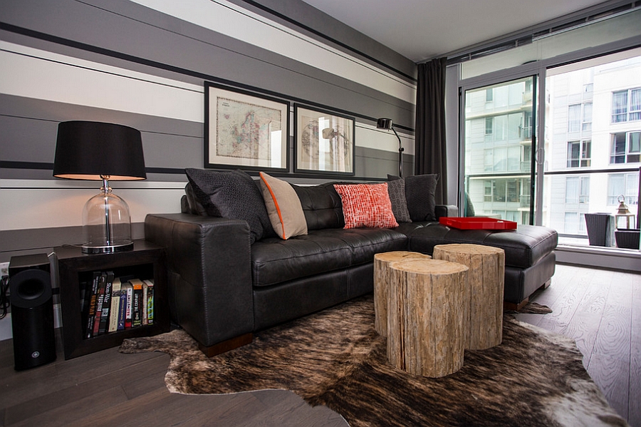 Custom made tree trunk coffee tables add rustic charm to the room [Design: Beyond Beige Interior]