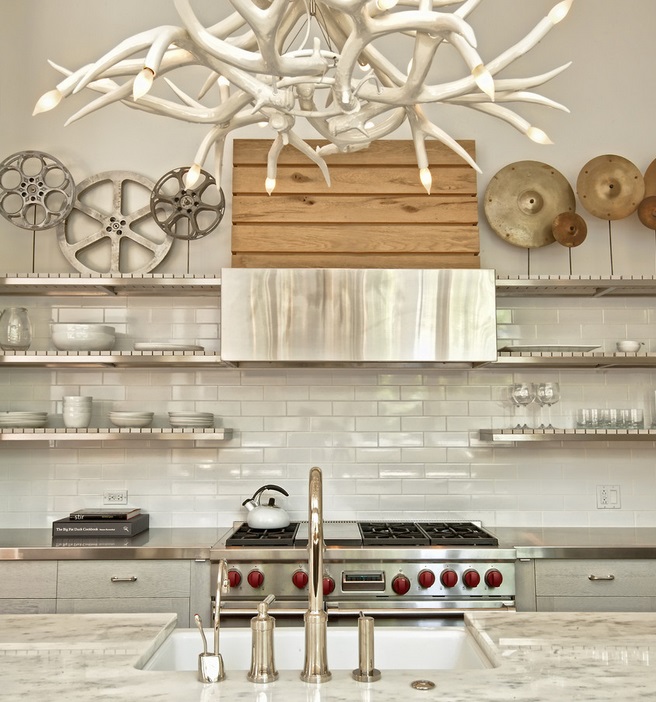 Custom stainless steel open shelving in a contemporary kitchen