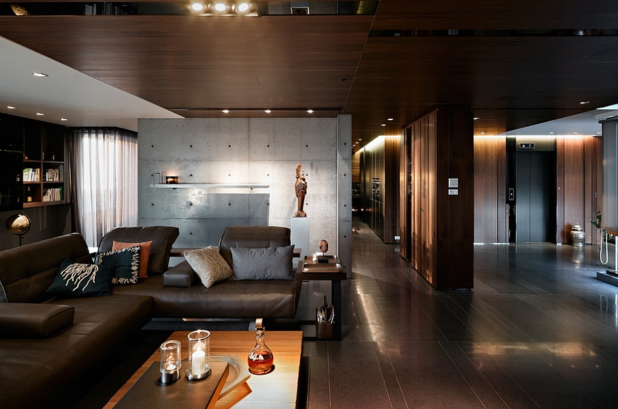 Deep, dark living room with cool textural contrast [Design: Leicht Hallandale Beach]