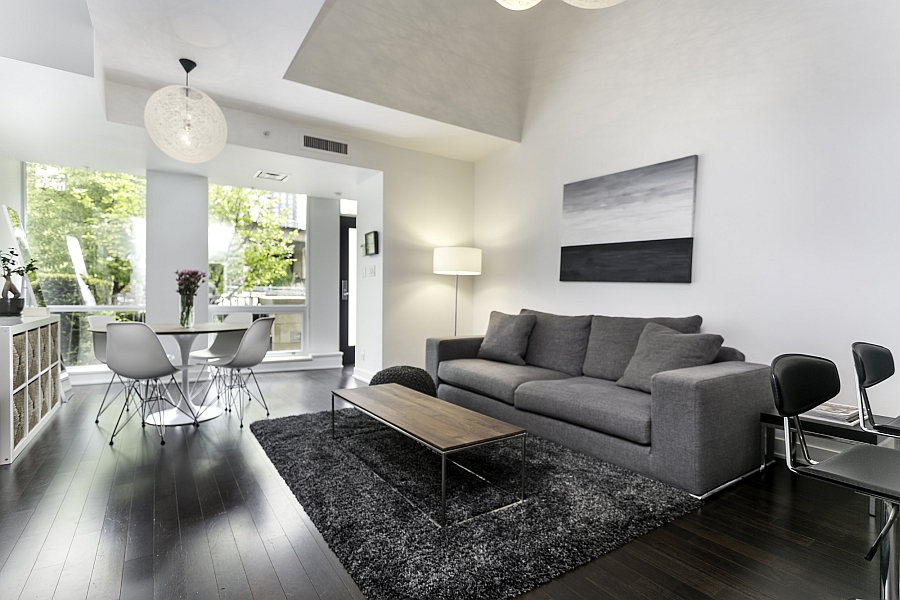 Eames chairs and tulip table make up the small dining area