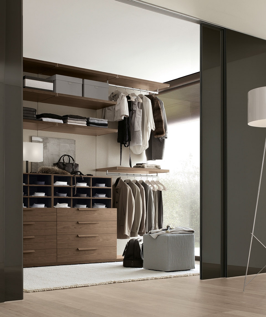 Exclusive walk-in closet design from Jesse with sliding black doors