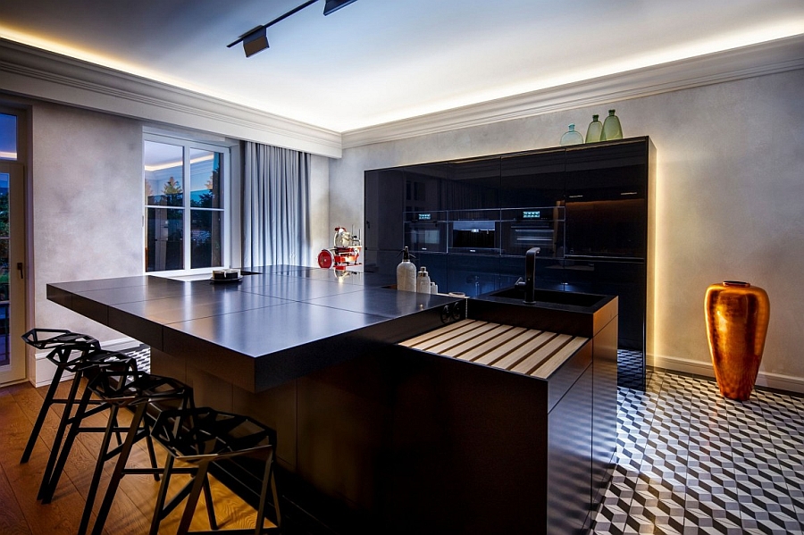 Exquisite contemporary kitchen with a smart breakfast area