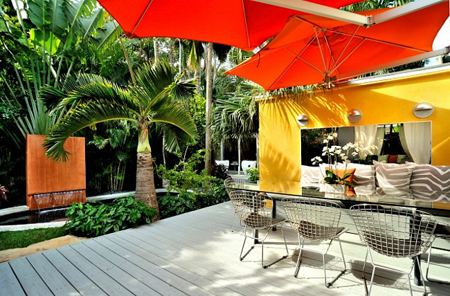 Garden room with bright orange and red accents