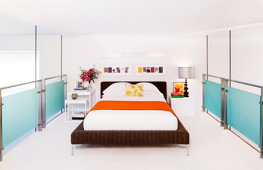 Loft bedroom uses stackable tables as space-saving nightstand