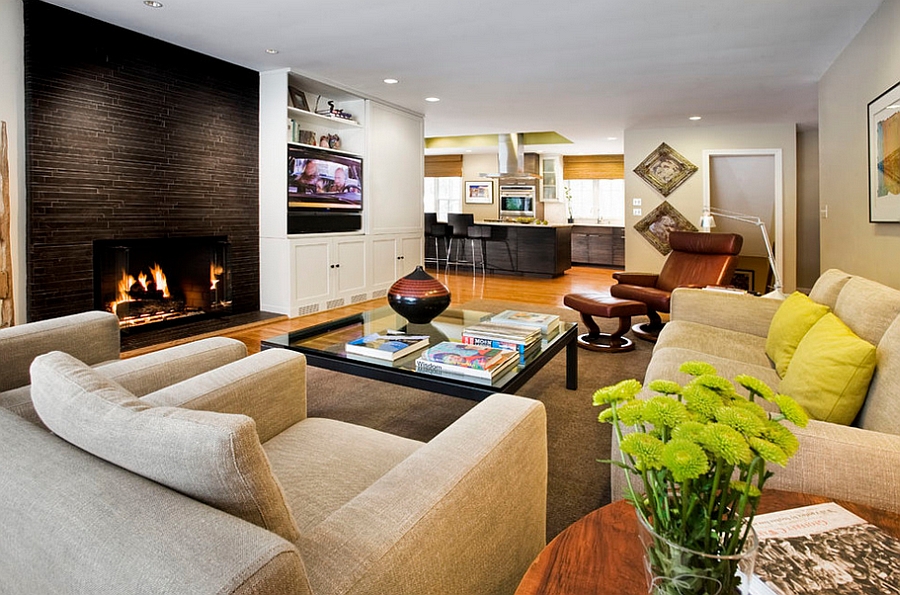 Masculine living space with a gorgeous fireplace at its heart [By: Pavilack Design]