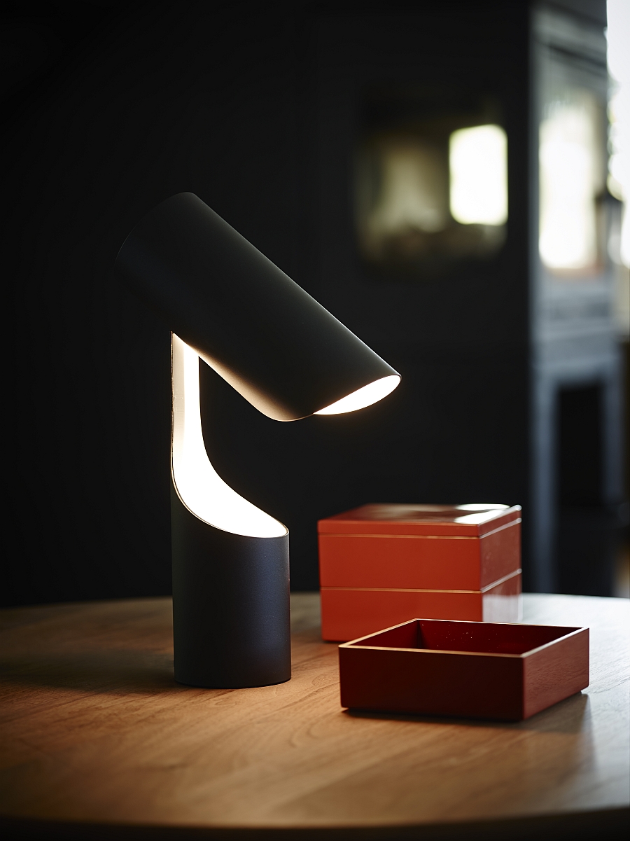 Minimalist table lamp from Le Klint offers focused lighting