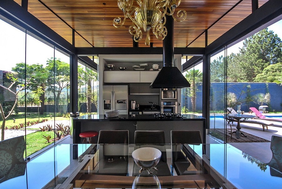 Open floor plan dining and kitchen space with a view of the outdoors