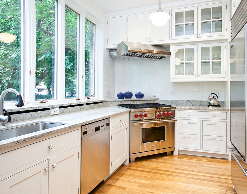 Small kitchen with corner range and hood