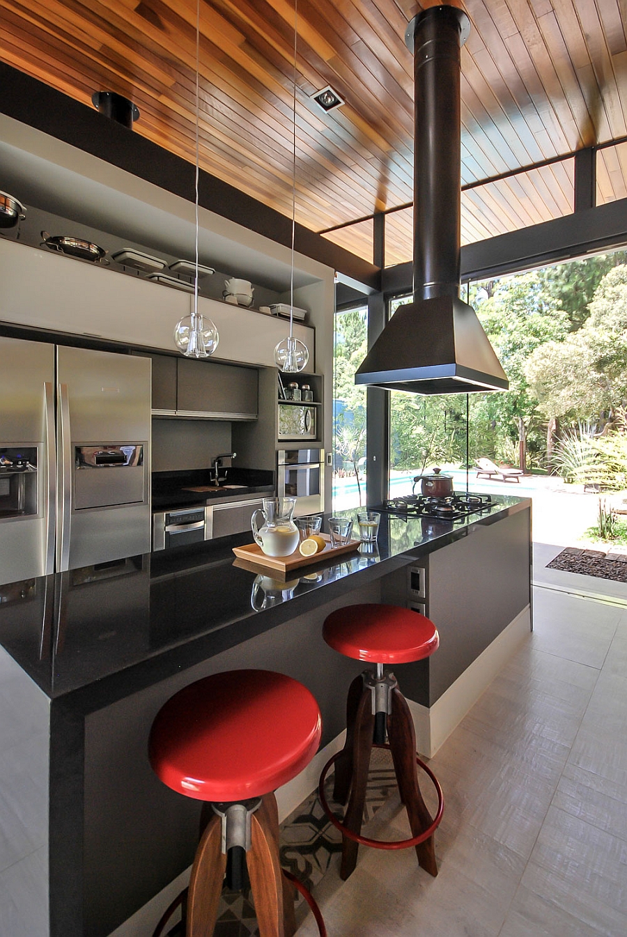 Smart modern kitchen that is connected with the backyard