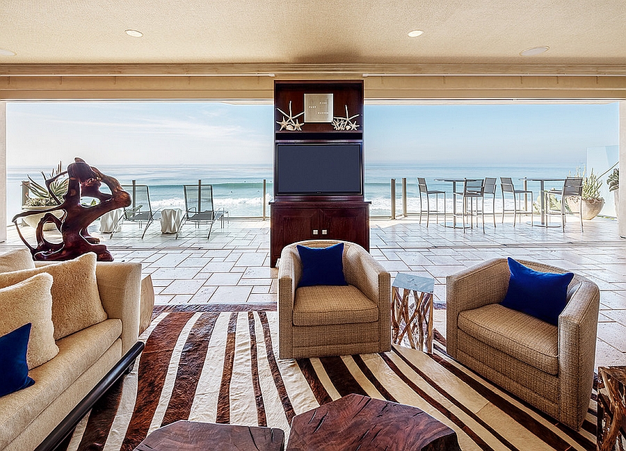 Stunning ocean view from the living room with coastal and tropical styles