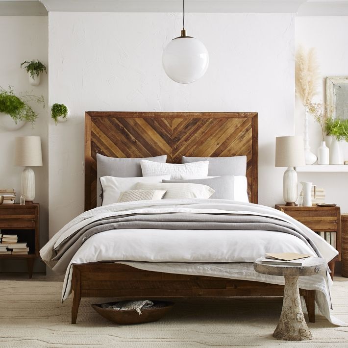 Textured bedroom with abundant plants