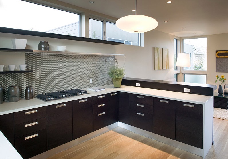 Thick stainless steel open shelving in a modern kitchen