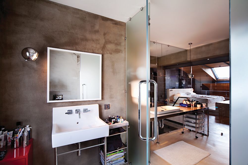 Top level of the penthouse loft with a creative bedroom and bath