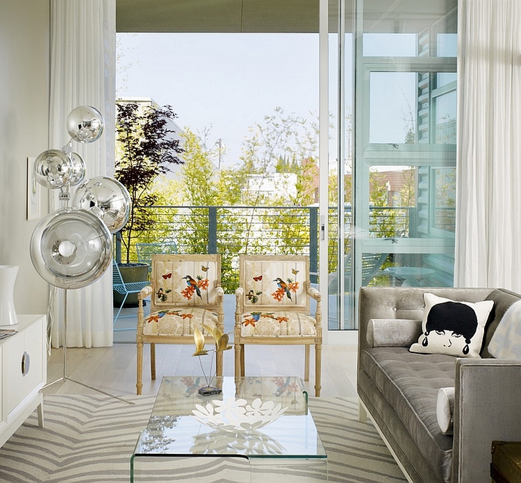 Twin chairs give the room a distinct feminine appeal