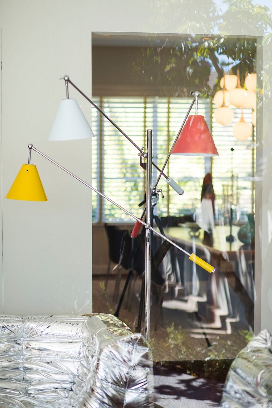 Versatile floor lamp with adjustable lamps makes for a practical and colorful addition