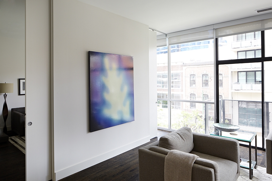 Versatile sliding doors help shape dynamic interiors inside the Chicago condominium