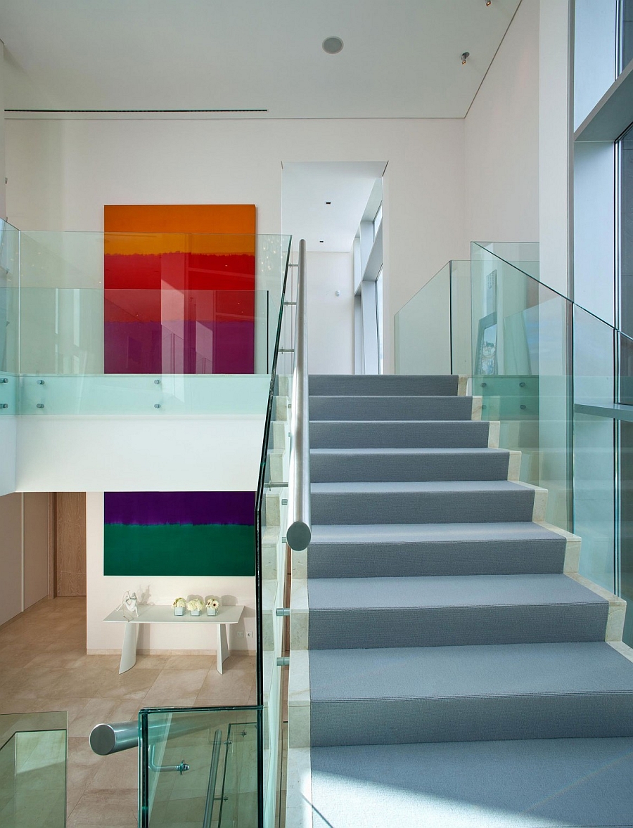 Vibrant art additions add color to the modern interior