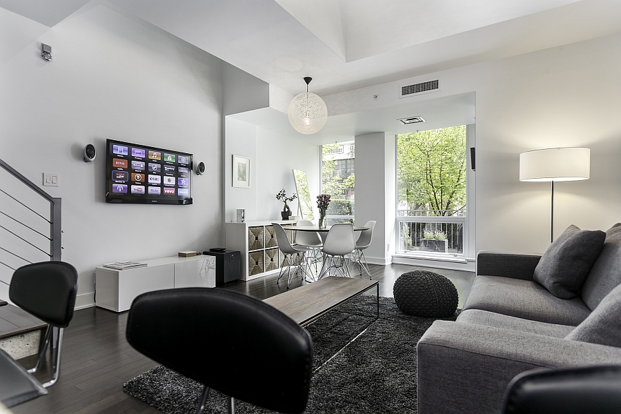 Wall mounted TV and sleek cabinets take up as little space as possible