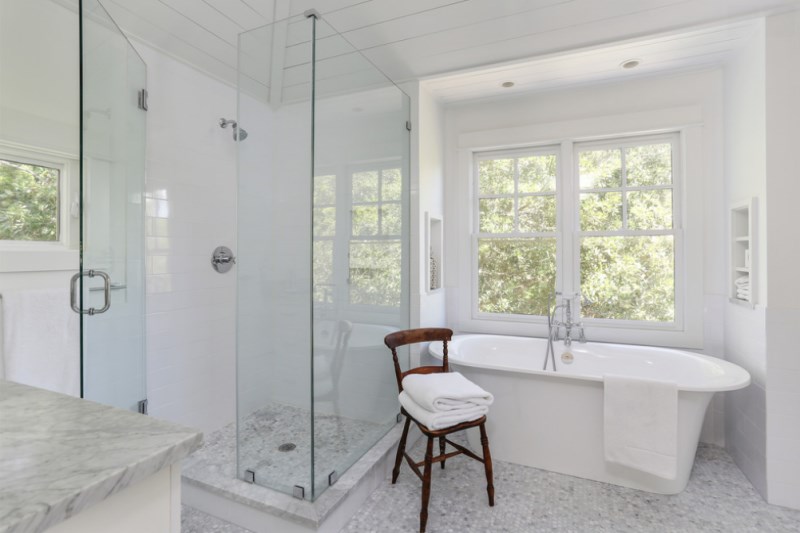 White towels in a marble bathroom