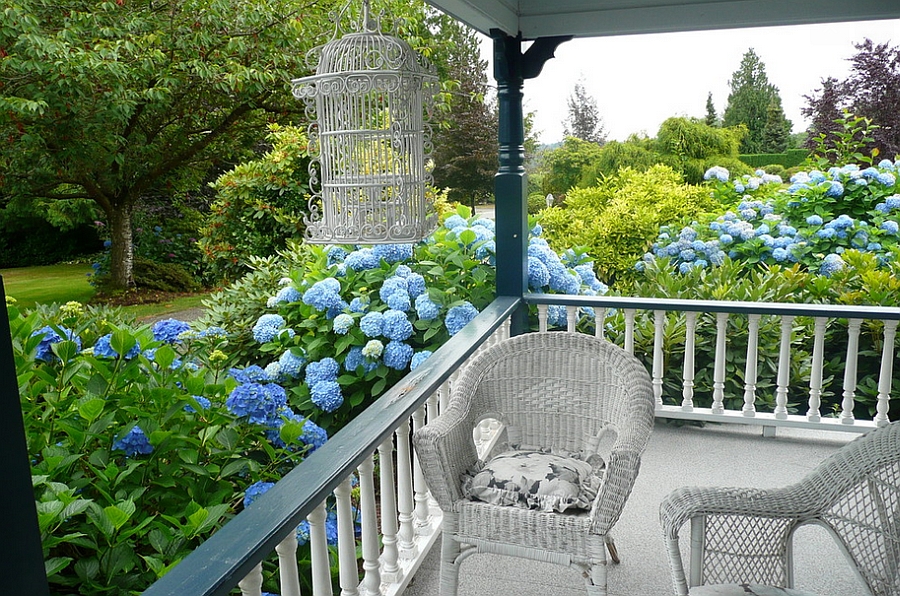 An empty birdcage in the porch makes a grand impression