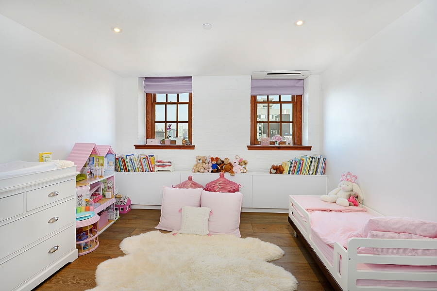 Beautiful kids' bedroom in white and pink