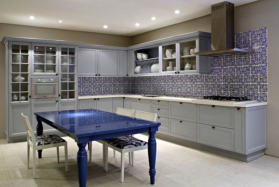 Beautiful tiled backsplash and bright dining table in the kitchen