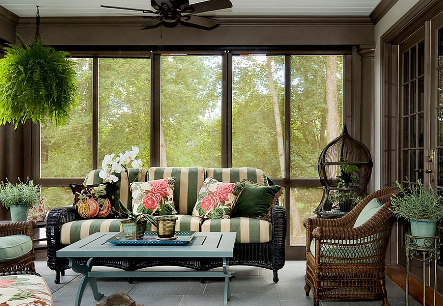 Birdcage blends in with the color scheme of the porch [Design: Crisp Architects]