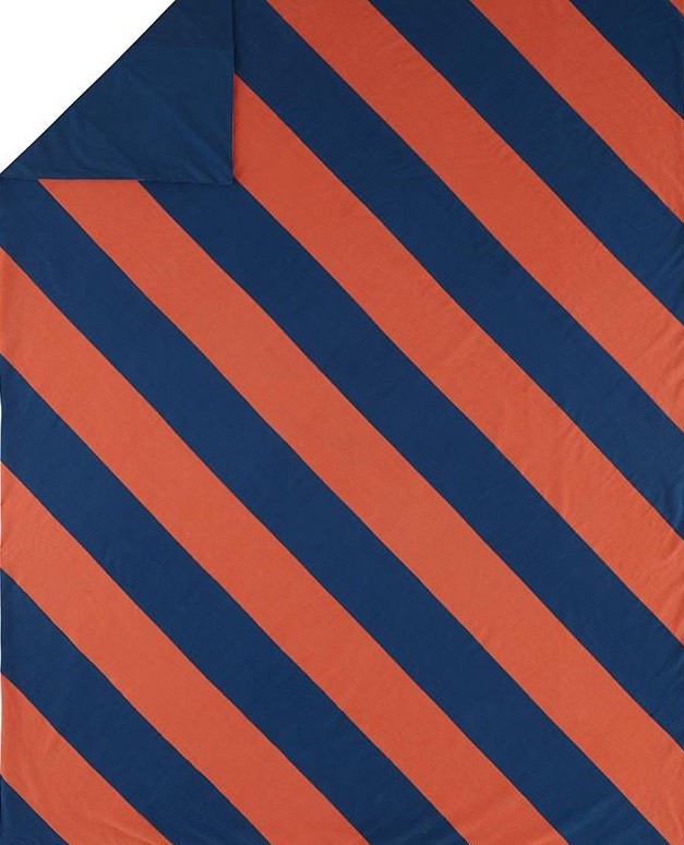 Blue and orange diagonal-striped bedding