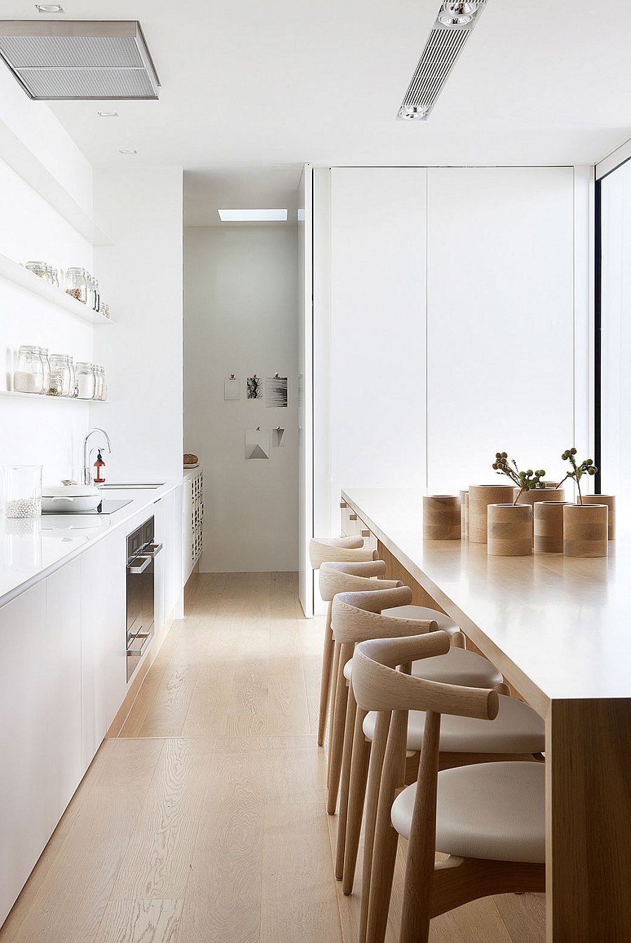 Contemporary kitchen with smart wooden kitchen island at its heart