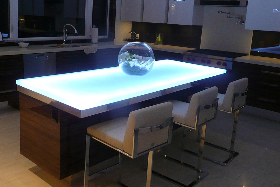 Cool-white LED light for the glass countertop is ideal for the contemporary kitchen