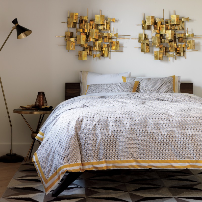 Cozy bedding with ochre accents