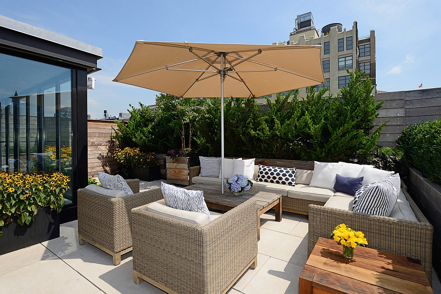 Dashing outdoor lounge area with view of the NYC skyline