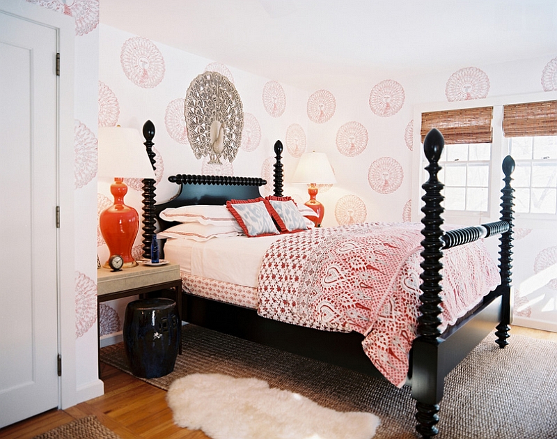 Eclectic bedroom with black wood spindle bed and orange accents [Design: Tilton Fenwick]