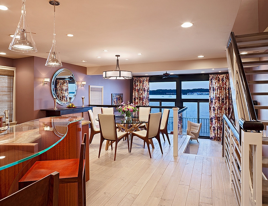 Elevated platform gives the dining space an unabated ocean view [From: Bruce Palmer Interior Design]